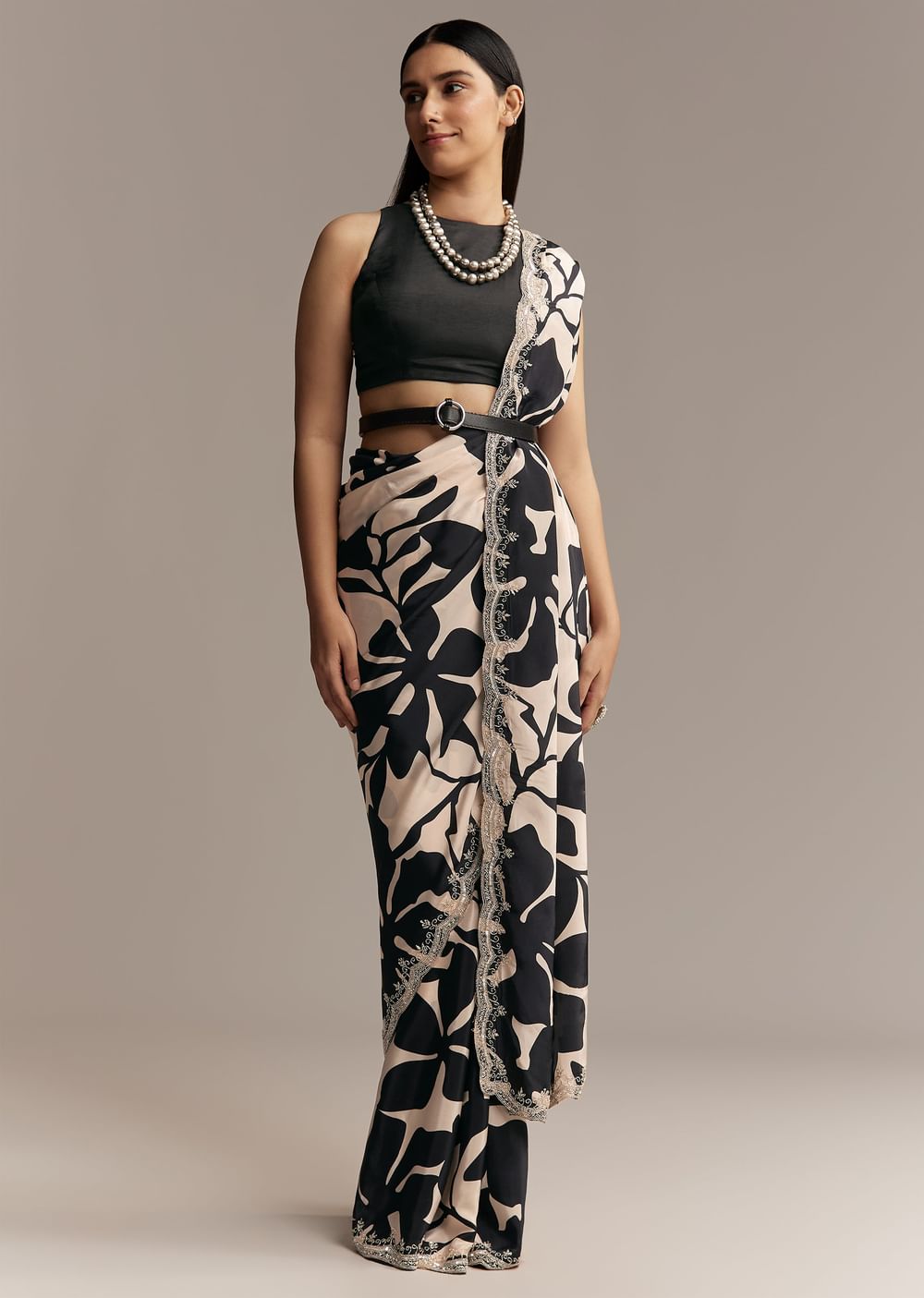 Beige Crepe Saree With Black Floral Print And Embellished Border