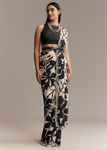 Beige Crepe Saree With Black Floral Print And Embellished Border