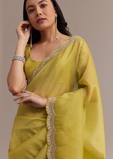 Mustard Tissue Organza Saree With Sequins Embellished Border