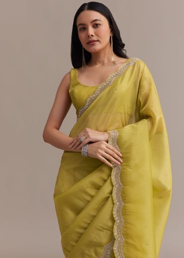 Mustard Tissue Organza Saree With Sequins Embellished Border