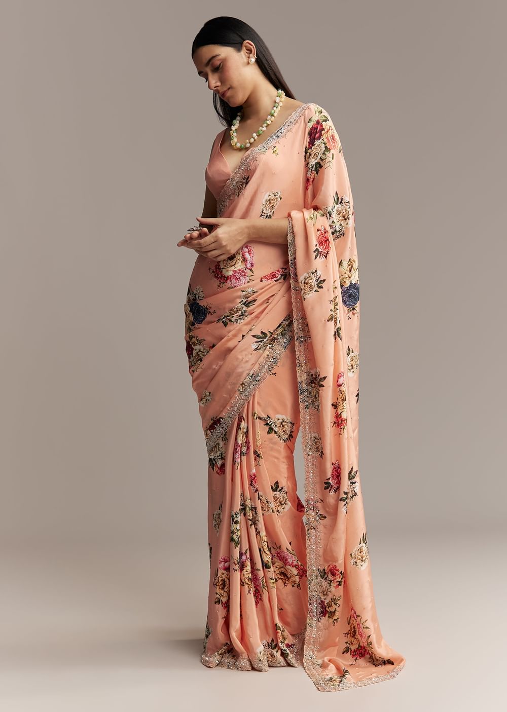 Peach Crepe Saree With Multicolor Floral Print And Embroidered Border
