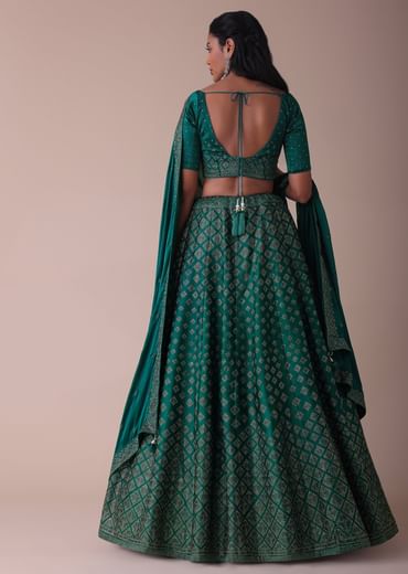 Deep Green Swarovski Embellished Lehenga In Wrinkle Satin