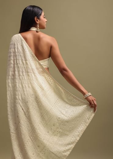 Off White Georgette Saree In Chikankari Work With Unstitched Blouse