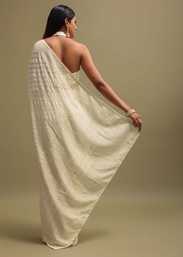 Off White Georgette Saree In Chikankari Work With Unstitched Blouse
