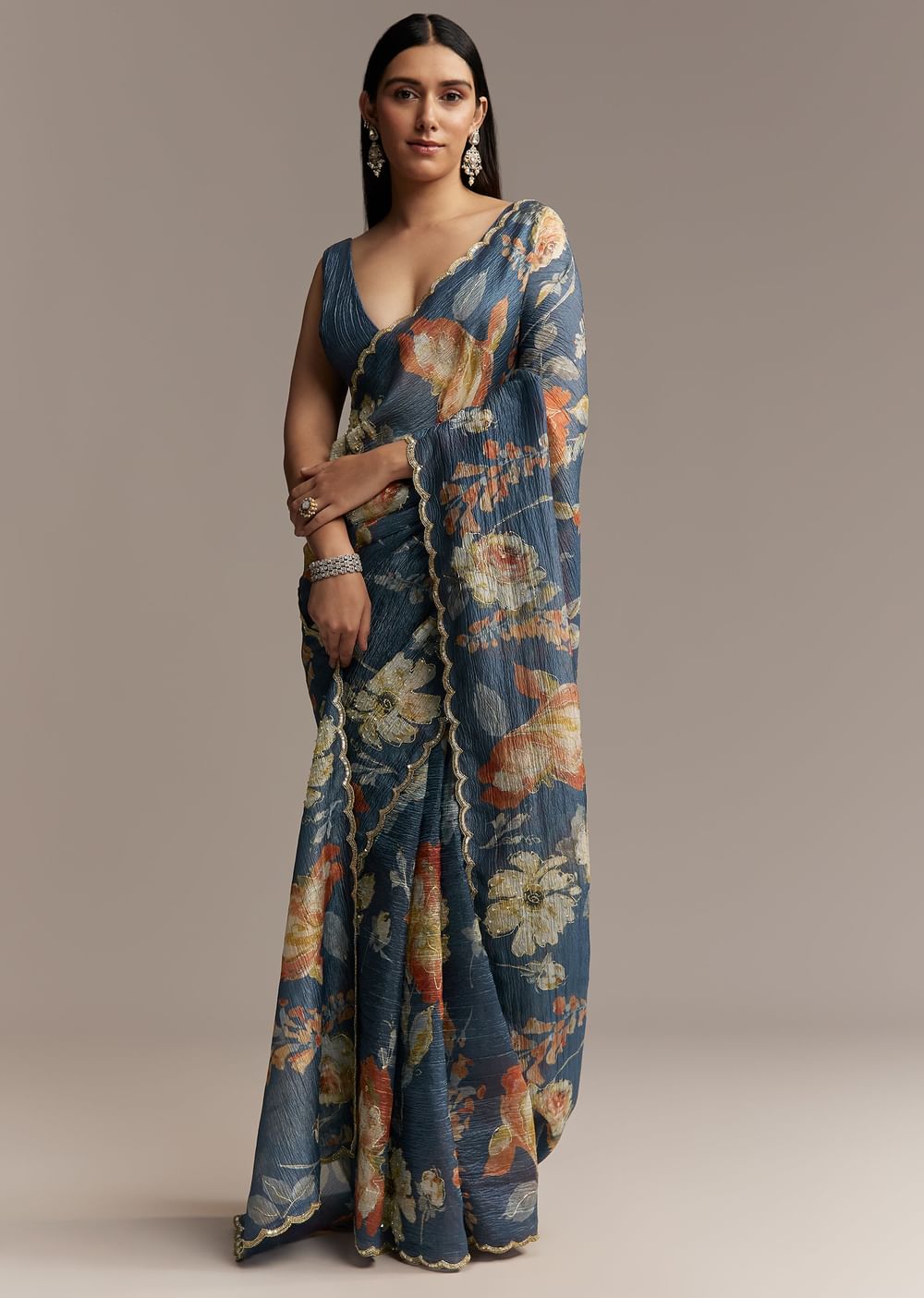 Teal Blue Tissue Saree With Floral Print And Embroidered Border