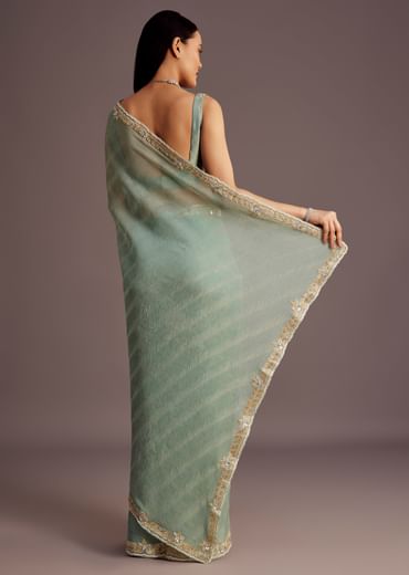 Turquoise Blue Crush Tissue Cutdana Work Saree With Embroidered Border