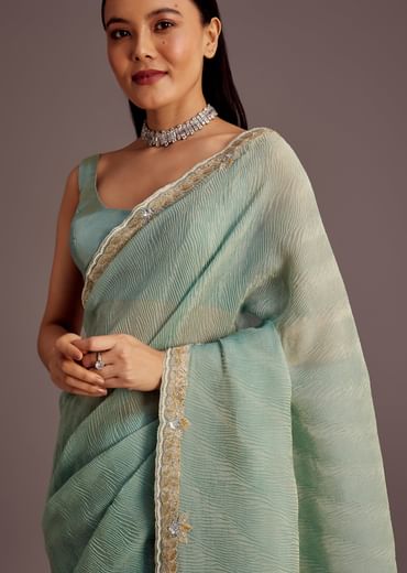 Turquoise Blue Crush Tissue Cutdana Work Saree With Embroidered Border