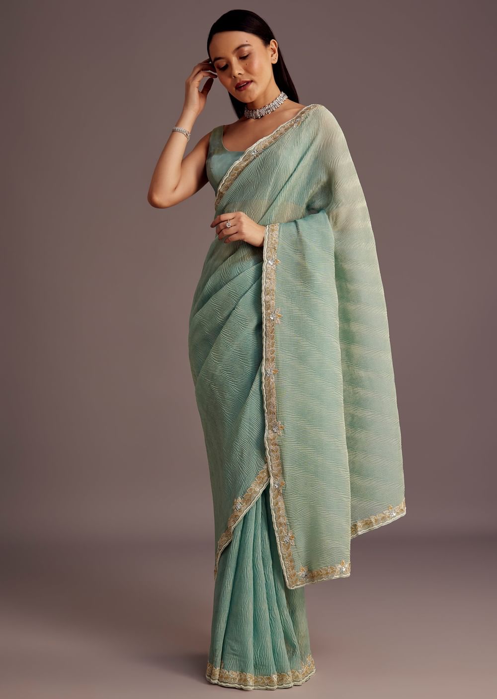 Turquoise Blue Crush Tissue Cutdana Work Saree With Embroidered Border