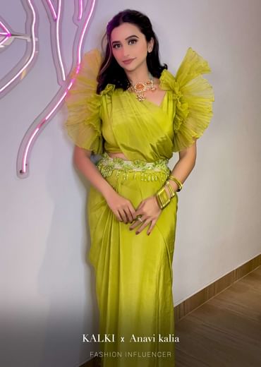 Lime Green Saree In Crepe With Elaborate Ruffle Sleeved Crop Top And Heavy Stone Embroidered Belt