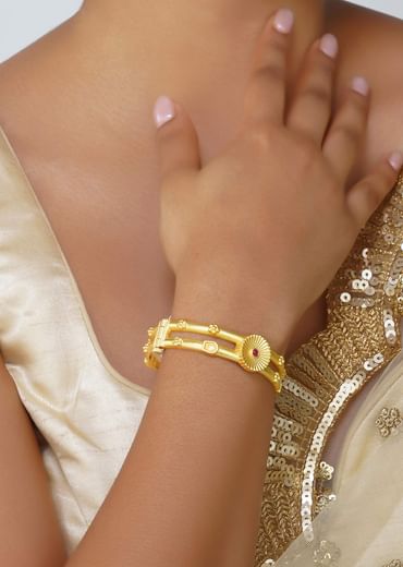 Antique Gold Bangle With Motifs And Zircon Details