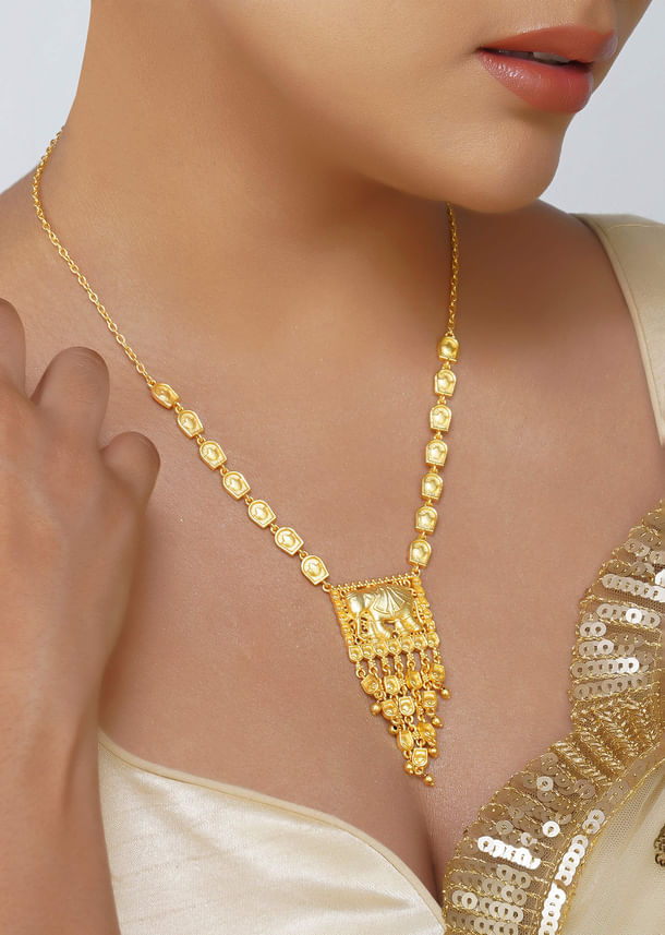 Antique Gold Pendant Necklace With Tusk Motif Antique Gold Pendant Necklace With Tusk Motif
