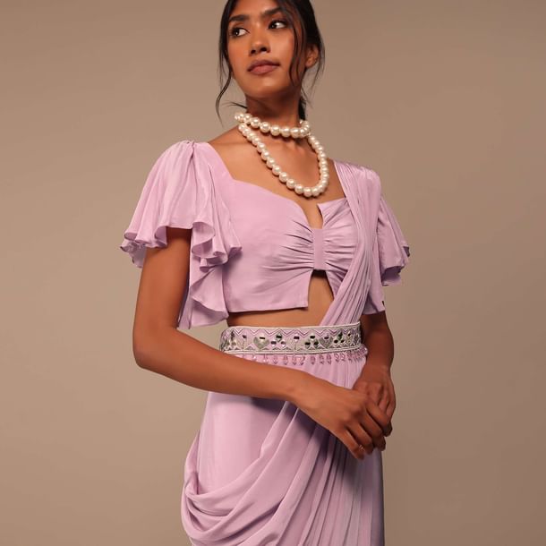 Baby Pink Crepe Saree With Fancy Bow Shaped Blouse And Belt Baby Pink Crepe Saree With Fancy Bow Shaped Blouse And Belt