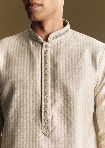 Beige Banarasi Jacquard Kurta Set With Intricate Cutwork