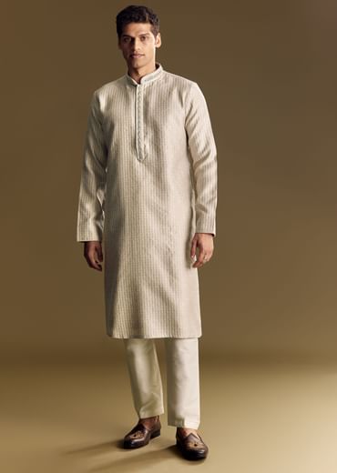 Beige Banarasi Jacquard Kurta Set With Intricate Cutwork
