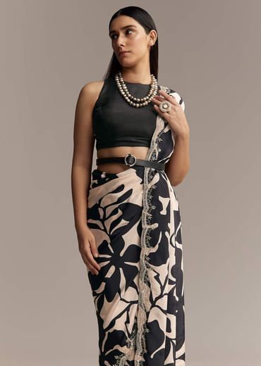 Beige Crepe Saree With Black Floral Print And Embellished Border
