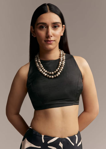 Beige Crepe Saree With Black Floral Print And Embellished Border