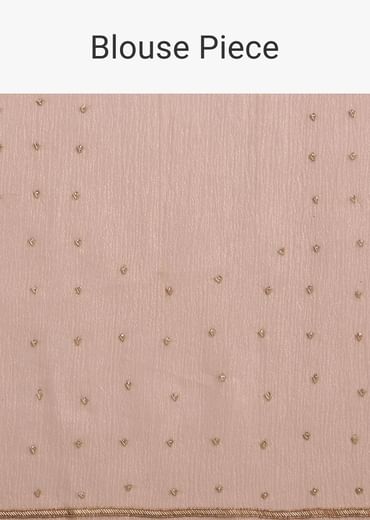 Beige Crushed Tissue Saree With Stone Embellishment And Glossy Finish
