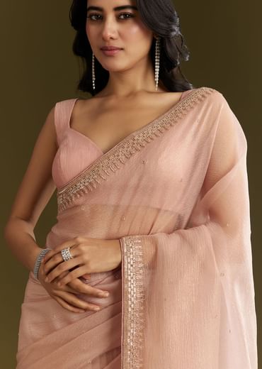 Beige Crushed Tissue Saree With Stone Embellishment And Glossy Finish