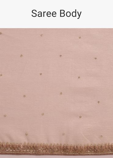 Beige Crushed Tissue Saree With Stone Embellishment And Glossy Finish