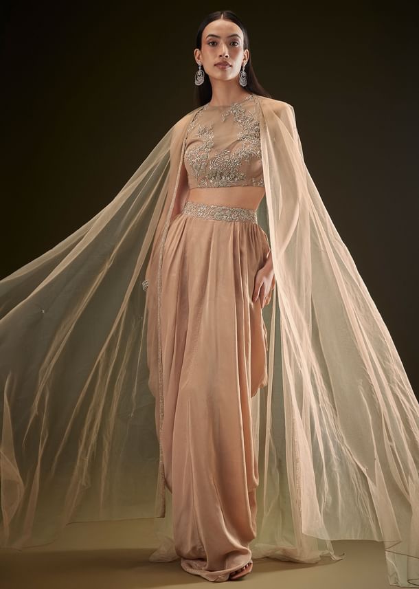 Beige Drape Dhoti Skirt With Embroidered Bustier And Long Cape Beige Drape Dhoti Skirt With Embroidered Bustier And Long Cape