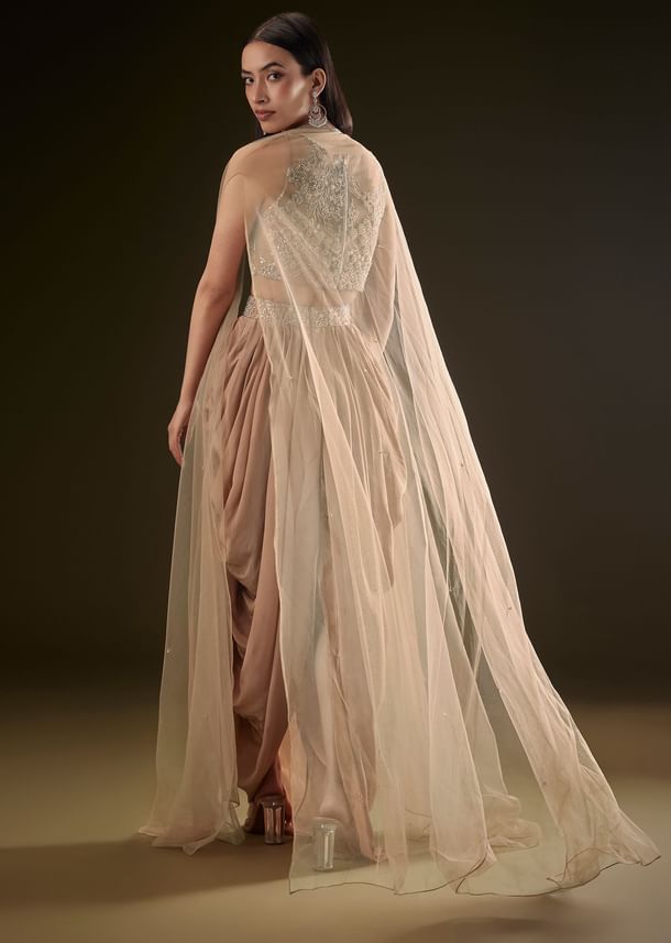 Beige Drape Dhoti Skirt With Embroidered Bustier And Long Cape Beige Drape Dhoti Skirt With Embroidered Bustier And Long Cape