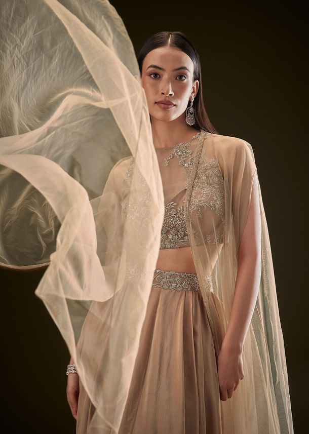 Beige Drape Dhoti Skirt With Embroidered Bustier And Long Cape Beige Drape Dhoti Skirt With Embroidered Bustier And Long Cape