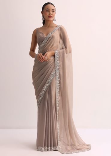 Beige Saree With Embroidered Border And Unstitched Blouse