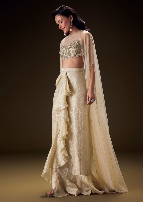 Beige Zardozi Embroidered Blouse With Brocade Drape Skirt And Net Cape