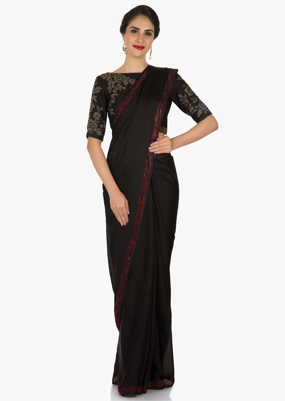Black georgette saree adorn in kundan embroidery work only on Kalki
