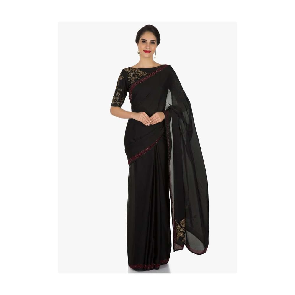 Black georgette saree adorn in kundan embroidery work only on Kalki