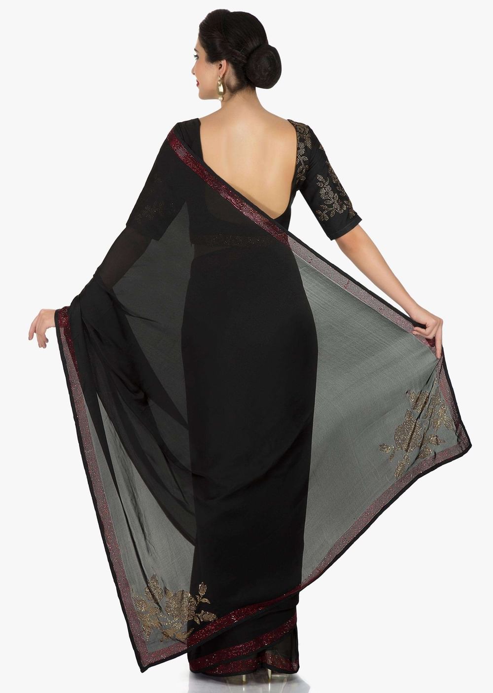 Black georgette saree adorn in kundan embroidery work only on Kalki