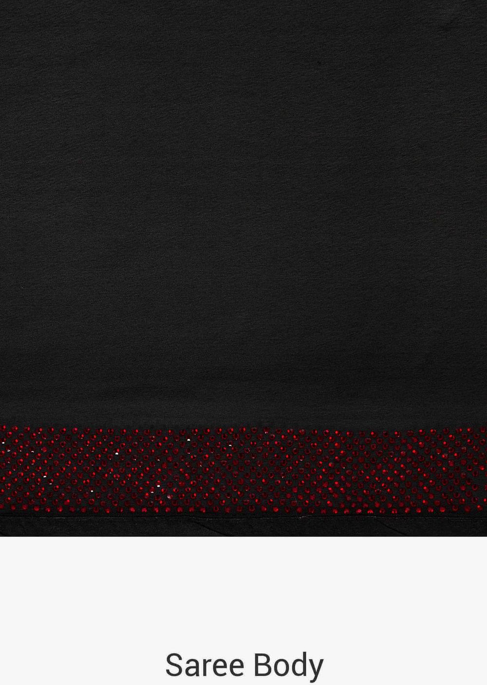 Black georgette saree adorn in kundan embroidery work only on Kalki