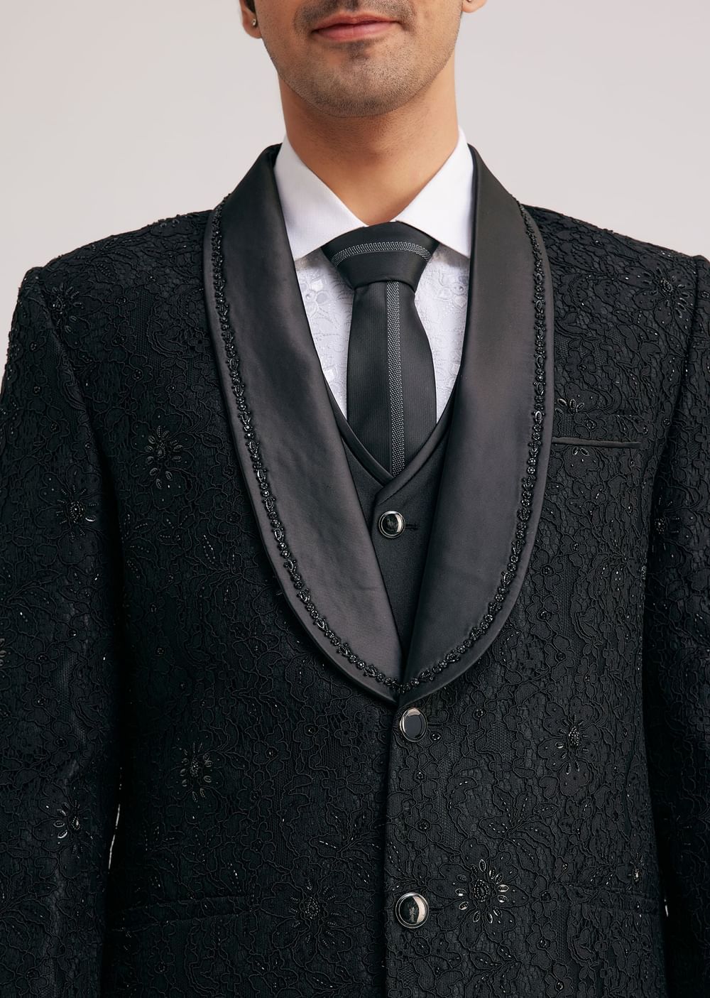 Black Silk Tuxedo With Stone Work And Net Detailing