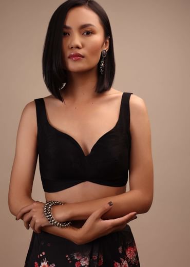 Black Sleeveless Blouse In Raw Silk With Sweetheart Neckline. Thick Strap And Adjustable Tassel Dori