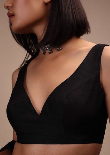 Black Sleeveless Blouse In A Sweetheart Neck Line Straight Hem Line With Back Zip Closure