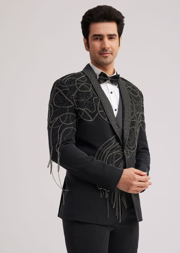 Black Suiting Tuxedo With Metallic Chain And Stone Work