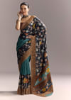 Blue Cotton Hand Painted Saree With Floral Motifs And Brown Border