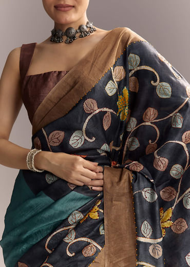 Blue Cotton Hand Painted Saree With Floral Motifs And Brown Border Blue Cotton Hand Painted Saree With Floral Motifs And Brown Border