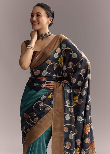 Blue Cotton Hand Painted Saree With Floral Motifs And Brown Border Blue Cotton Hand Painted Saree With Floral Motifs And Brown Border