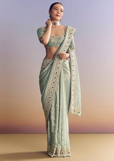 Blue Tissue Saree With Embroidered Border And Emerald Stone