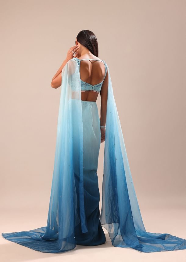 Blue Pre Pleated Twisted Skirt And Blouse With Attched Cape
