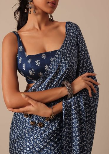 Blue Printed Saree In Satin With Tassel Pallu And Unstitched Blouse Piece
