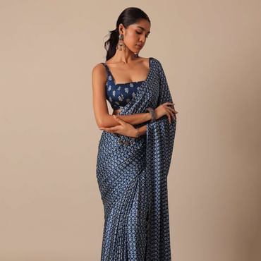 Blue Printed Saree In Satin With Tassel Pallu And Unstitched Blouse Piece