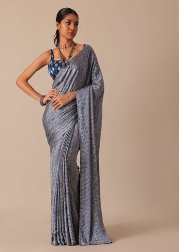 Blue Printed Saree In Satin With Tassel Detail And Unstitched Blouse Fabric