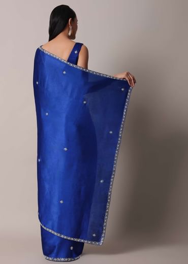 Blue Satin Saree With Stone Embellished Border And Unstitched Blouse Piece