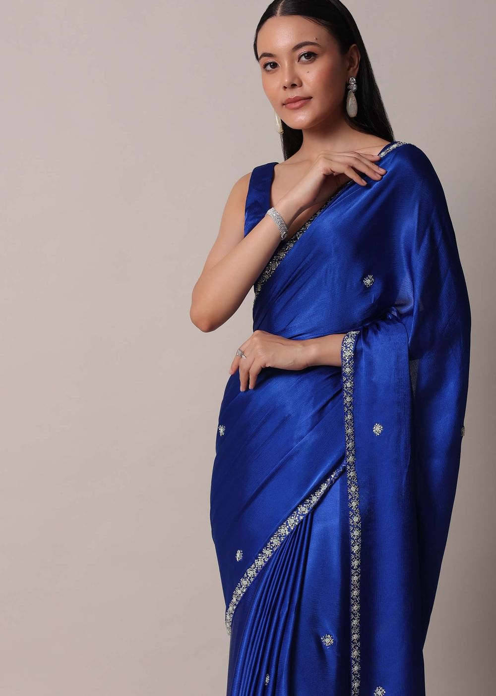 Blue Satin Saree With Stone Embellished Border And Unstitched Blouse Piece