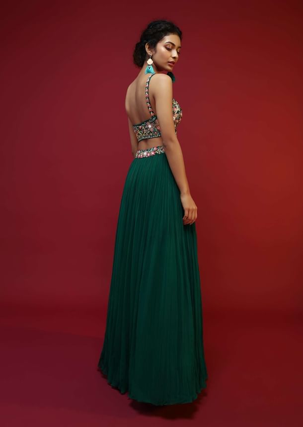 Bottle Green Lehenga Choli And Sleeveless Peplum Jacket Adorned With Colorful Resham And Moti Embroidered Flowers