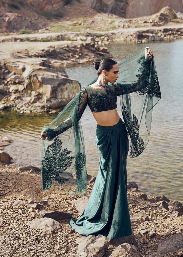Bottle Green Feather Blouse With Draped Skirt And Dupatta Bottle Green Feather Blouse With Draped Skirt And Dupatta