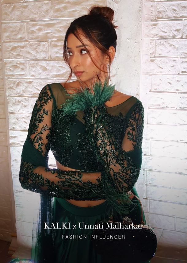 Bottle Green Feather Blouse With Draped Skirt And Dupatta Bottle Green Feather Blouse With Draped Skirt And Dupatta