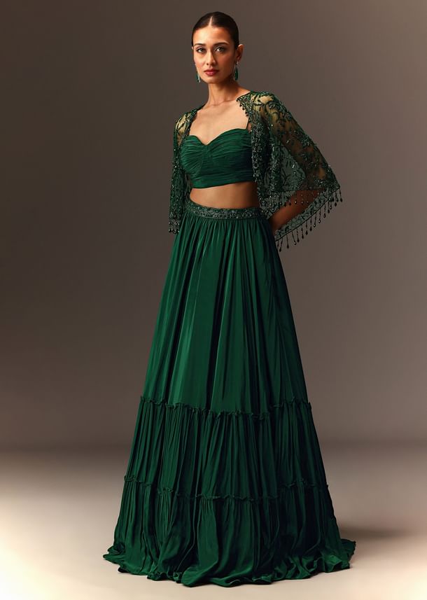 Bottle Green Tiered Lehenga With Net Cape